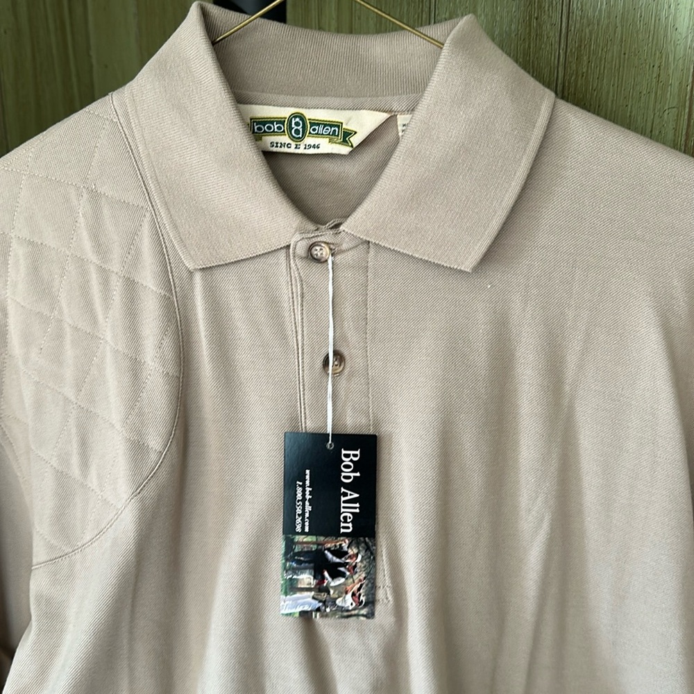 Bob Allen short sleeve tan shirt.
Never been worn. Excellent condition size L